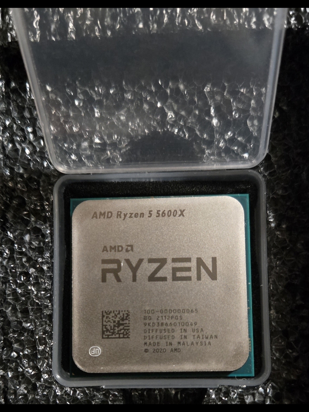 AMD Ryzen 5 5600X CPU with Silver and Teal Accents